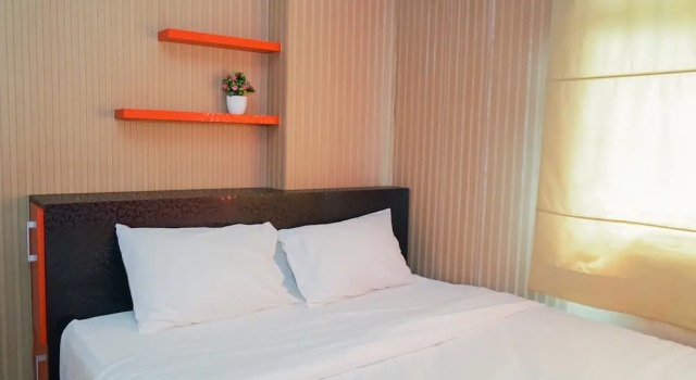Номер Standard Comfy and Clean 2BR Green Pramuka Apartment