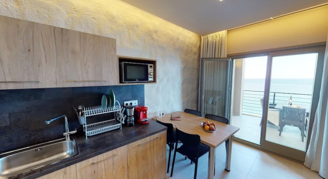 Семейные апартаменты с 2 комнатами с балконом и oceanfront Kallia Suites