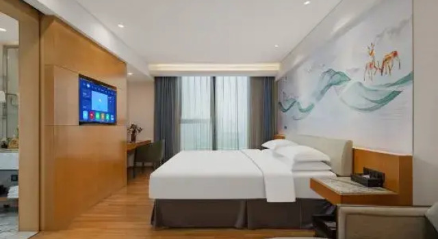 Люкс Deluxe Olympic Twin Towers Hotel（Gengwen Road Metro Station Store）