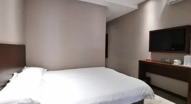 Кровать в общем номере Madiel Su Hotel
