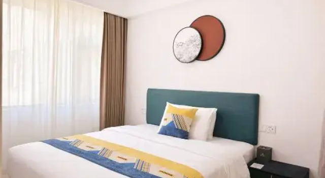 Четырёхместный семейный люкс с балконом и с видом на море Beihai He'an Coast Liwan Homestay
