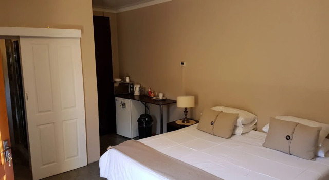 Mckala Guesthouse, Забронировать Гостевой дом Гостевые дома Кимберли, Гостевой дом