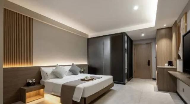 Люкс с 2 комнатами Elong R.YUN Hotel (Haikou Riyueguangchang Duty Free Shop)