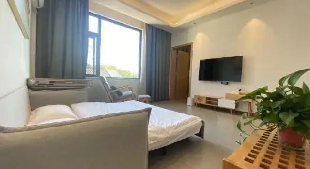 Люкс Taoyuan Xishe Homestay (Taohuayuan Scenic Area)
