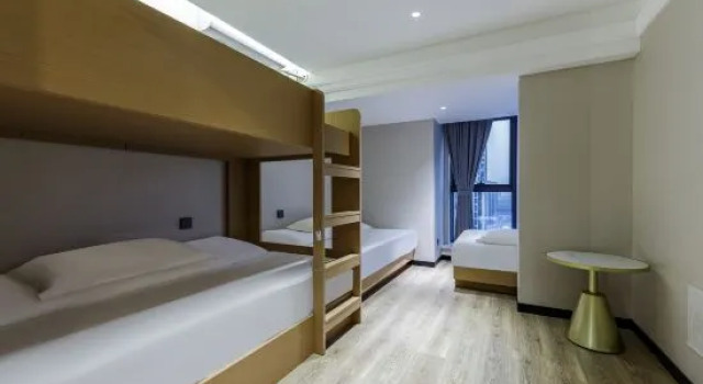 Кровать в общем номере Haoer E-sports Hotel (High-tech Wanda Science Avenue Branch)