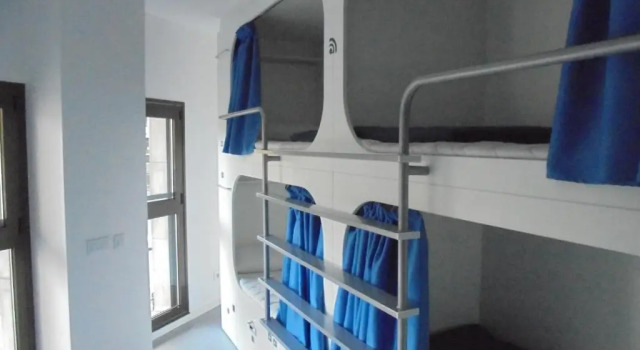 Кровать в общем номере Dream Cube Hostel
