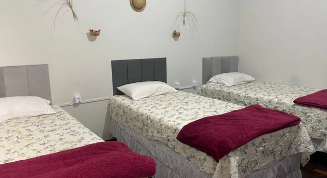 Кровать в общем номере Açaizeiro Hostel