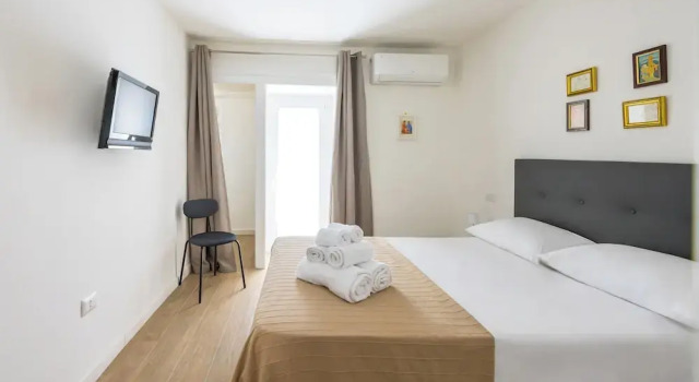 Terrazza Spaccanapoli by Napoliapartments, Забронировать Апартаменты/квартира Апартаменты Неаполя, рядом с Accademia di Belle Arti di Napoli, Апартаменты/квартира