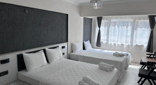Четырёхместный семейный номер Standard c 1 комнатой с балконом Ephesus Nobel Otel