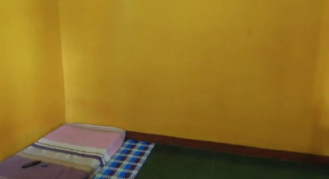 Кровать в общем номере Homestay Ngudi