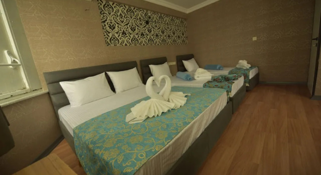 Четырёхместный семейный номер Standard Omega Luxx Hotel