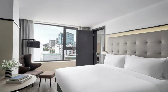 Люкс Grand M Village Hotel Tôn Thất Đạm, a brand of Modern Village Lifestyle