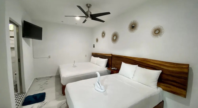 Трёхместный семейный номер Standard Hotel Naomi