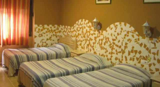 Hostal Tartessos, Забронировать Отель Сьютат Белла 