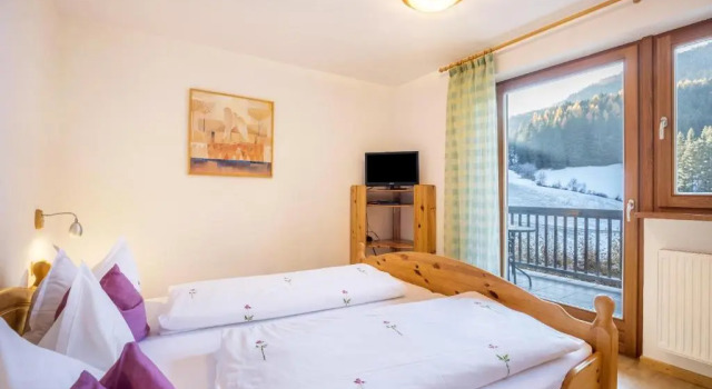 Lettnerhof Bnb Wohnung 4, Забронировать Отель «постель и завтрак» Монгуэльфо План-де-Коронес, рядом с Guggenberg Platter