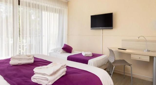 Трёхместный номер Hotel Club Le Capet