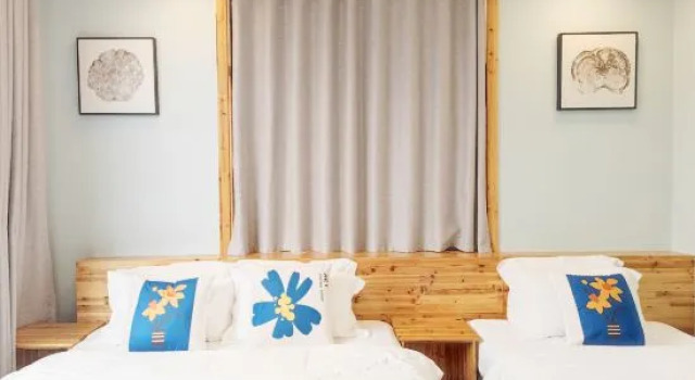 Кровать в общем номере Lushan West Sea at Waterside B&B