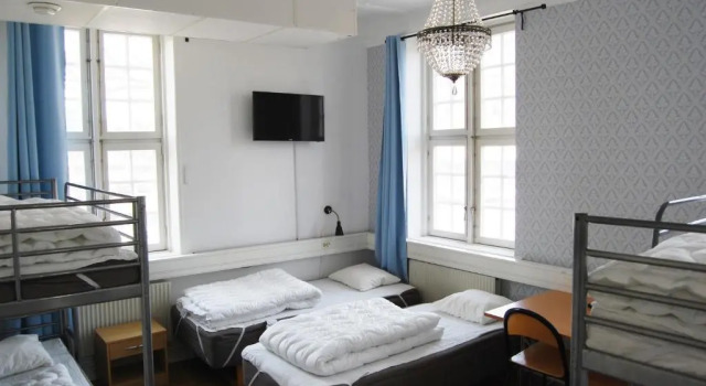 Кровать в общем номере Halmstad Hotell & Vandrarhem Kaptenshamn
