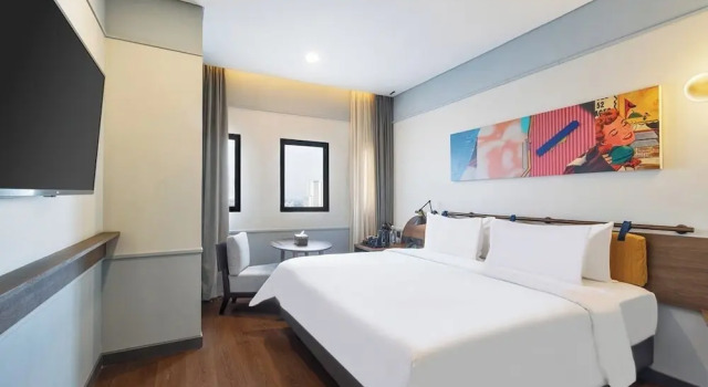 Номер Deluxe ARTOTEL Hub Simpang Temu Jakarta