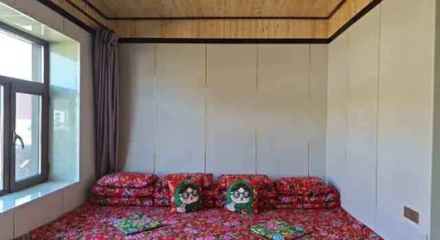 Łóżko w pokoju wieloosobowym Jiudingge Inn