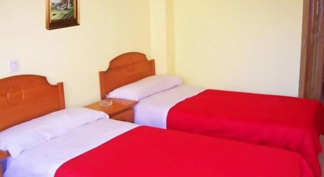 Номер Standard Pension San Marcos
