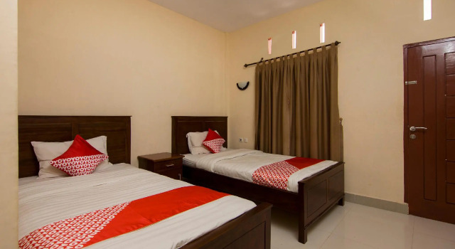 OYO 1488 Prima Hotel, Rezerwuj Hotel Sialanguan Pangururan