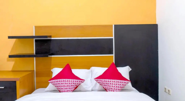 Deluxe double chambre OYO 617 Sukaraja Residence Syariah