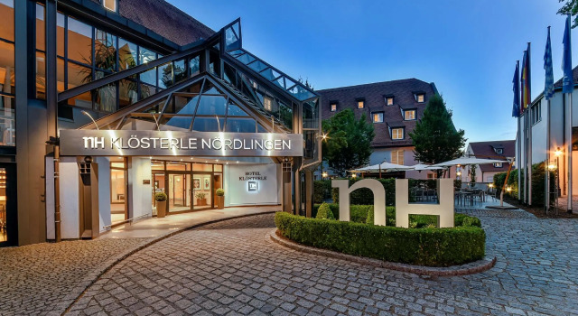 Кровать в общем номере elaya hotel noerdlingen, Trademark by Wyndham