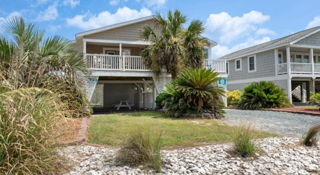 Footprints In The Sand by Oak Island Accommodations