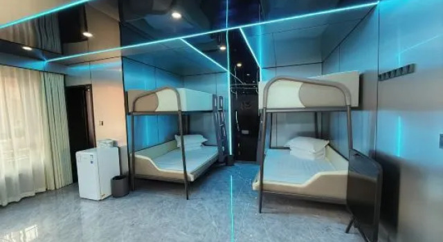Кровать в общем номере Lemi E-Sports Hotel