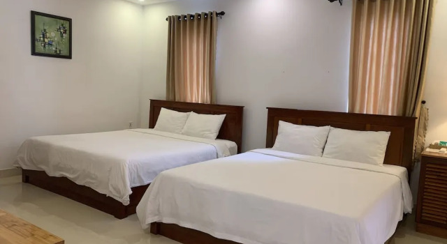 Четырёхместный семейный номер Standard с балконом Hoi An New Life Homestay & Villa