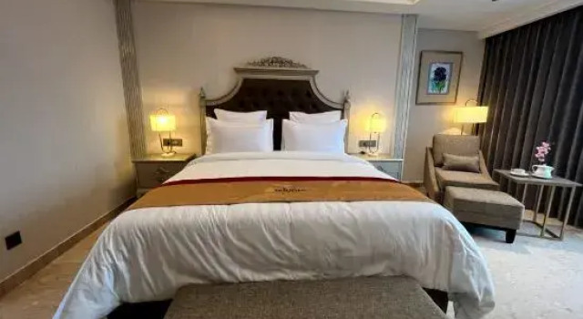 Bed in slaapzaal Grand Travello Hotel Bekasi