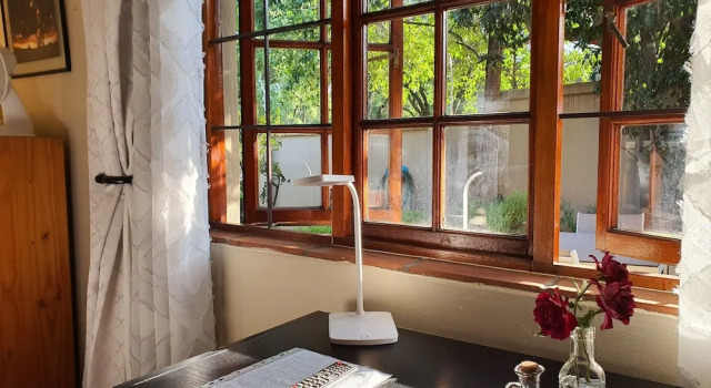 Conforto quarto com vista para o jardim Pepper Tree BnB