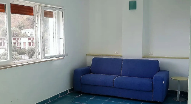Двухместные апартаменты Comfort Цокольный этаж с частичным видом на море Home - Discover Cilento