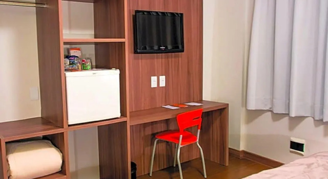 Кровать в общем номере Hotel Continental Business - 200 metros do Complexo Hospitalar Santa Casa
