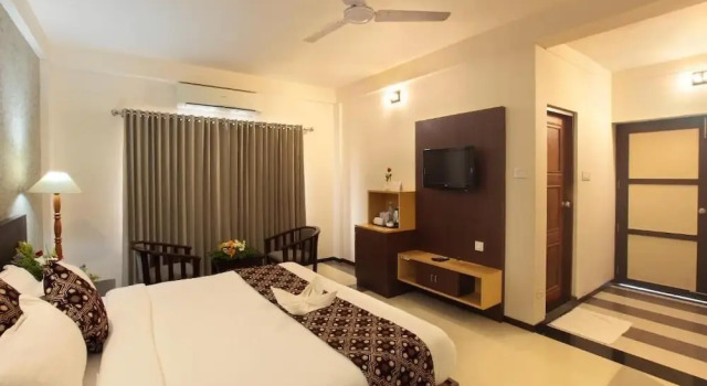 Hotel Pushpak Calicut International Airport