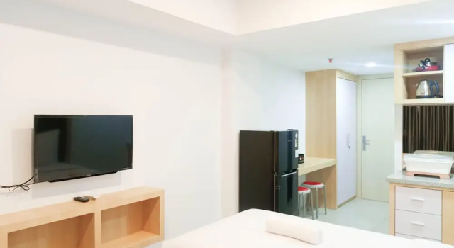 Апартаменты Minimalist Studio At De Prima Apartment