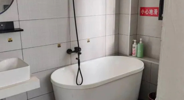 Łóżko w pokoju wieloosobowym Muxi Inn
