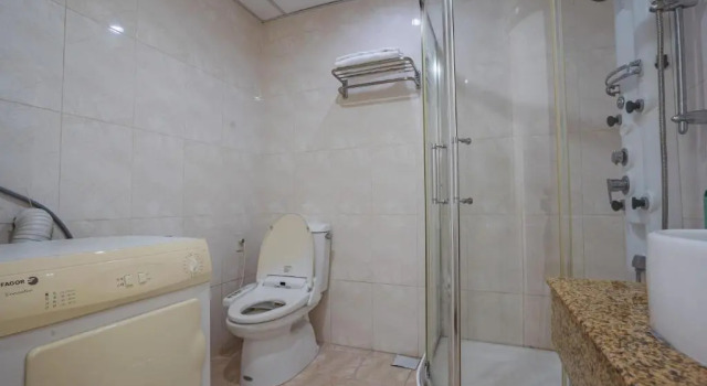 Апартаменты с 2 комнатами Coco Flower Village Serviced Apartment