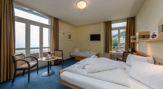 Трёхместный номер Hotel Victoria Lauberhorn Wengen, a Faern Collection Hotel