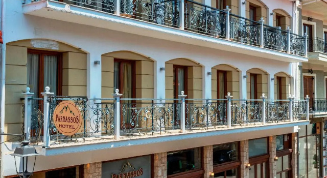 Кровать в общем номере Parnassos Delphi Hotel