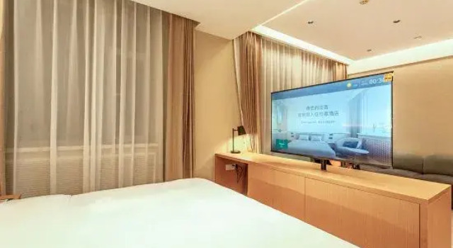 Люкс Deluxe Dalian Yijia Business Hotel