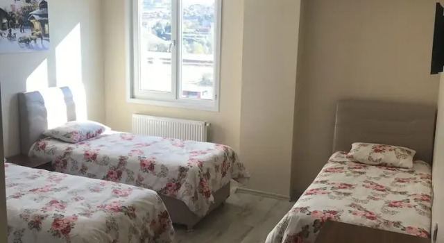Трёхместный люкс Gunes Hotel