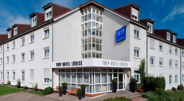 Кровать в общем номере Tryp by Wyndham Luebeck Aquamarin