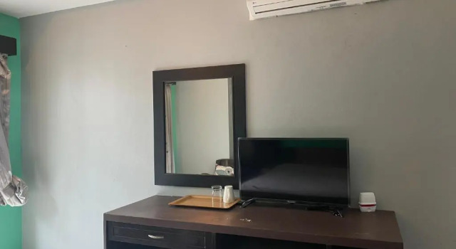 Кровать в общем номере New Lavender Hotel Patong