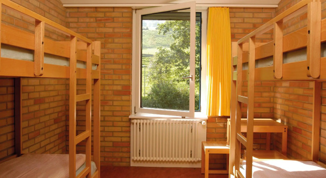 Кровать в общем номере St. Gallen Youth Hostel