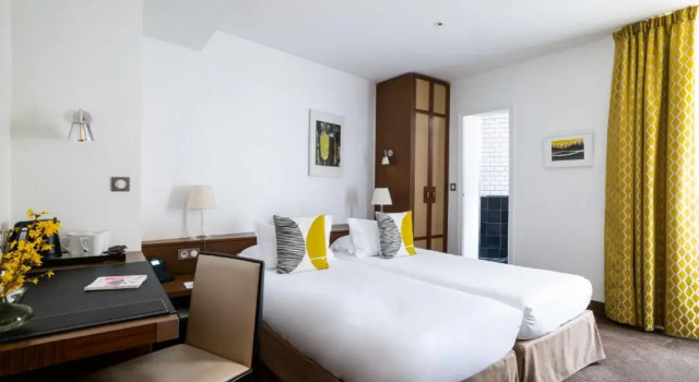 Трёхместный номер Hôtel Le Colisée