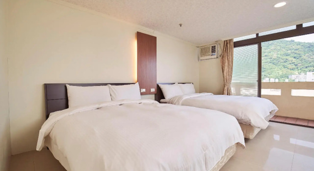 Кровать в общем номере Su Ao Hotel