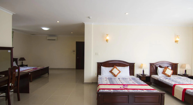 Кровать в общем номере Minh Dam Hotel