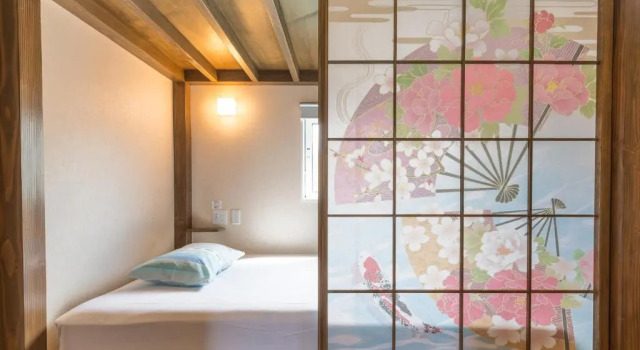 Кровать в общем номере Maisan-chi Guesthouse & Cafe